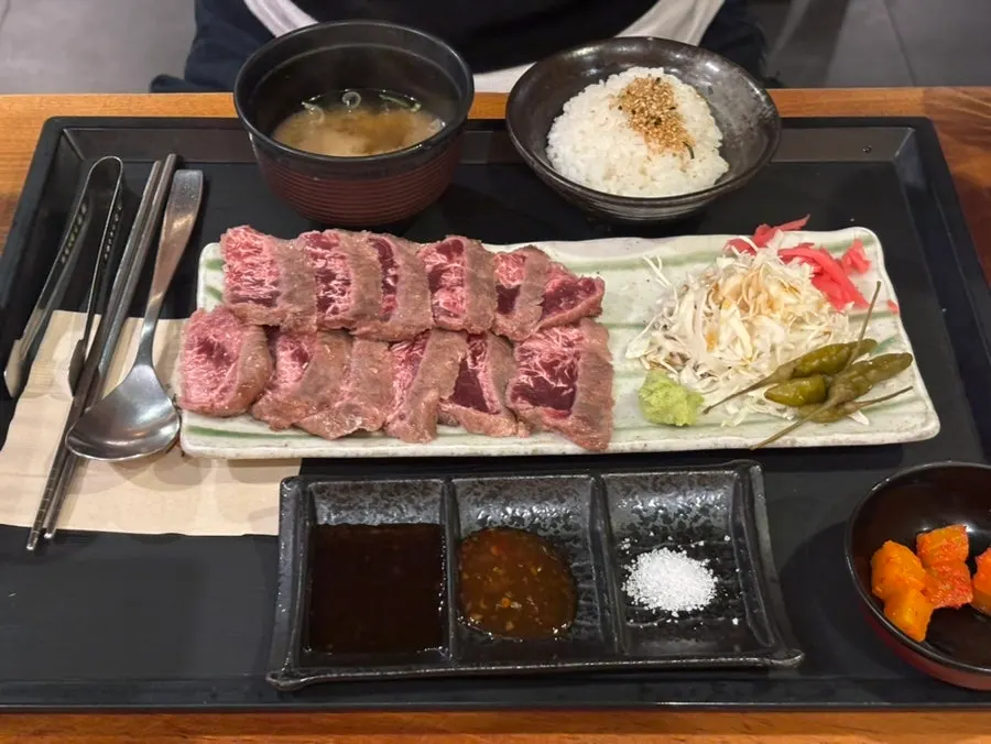 Gyukatsu and gyusteki set served with a tabletop grill