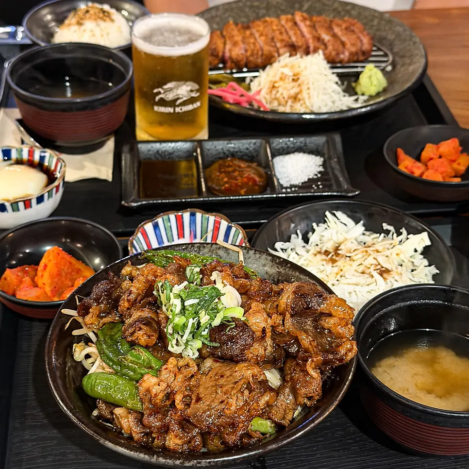 Table set with both the gyukatsu and the beef belly rice bowl