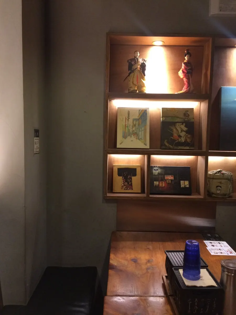 Wood-toned, Japanese-style seating inside Hurato Sikdang