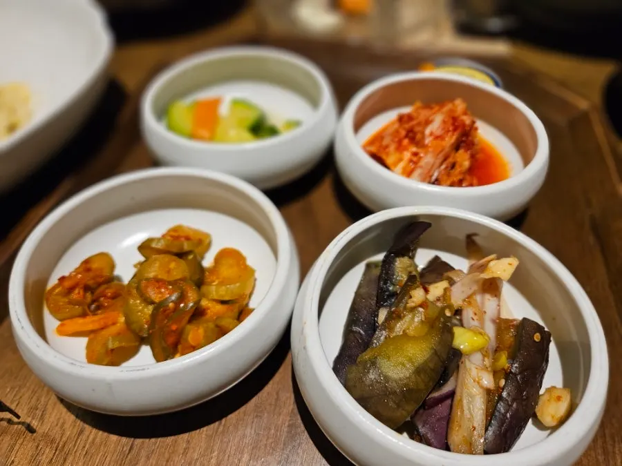 A plate of abalone, soy-marinated shrimp and soft-boiled egg