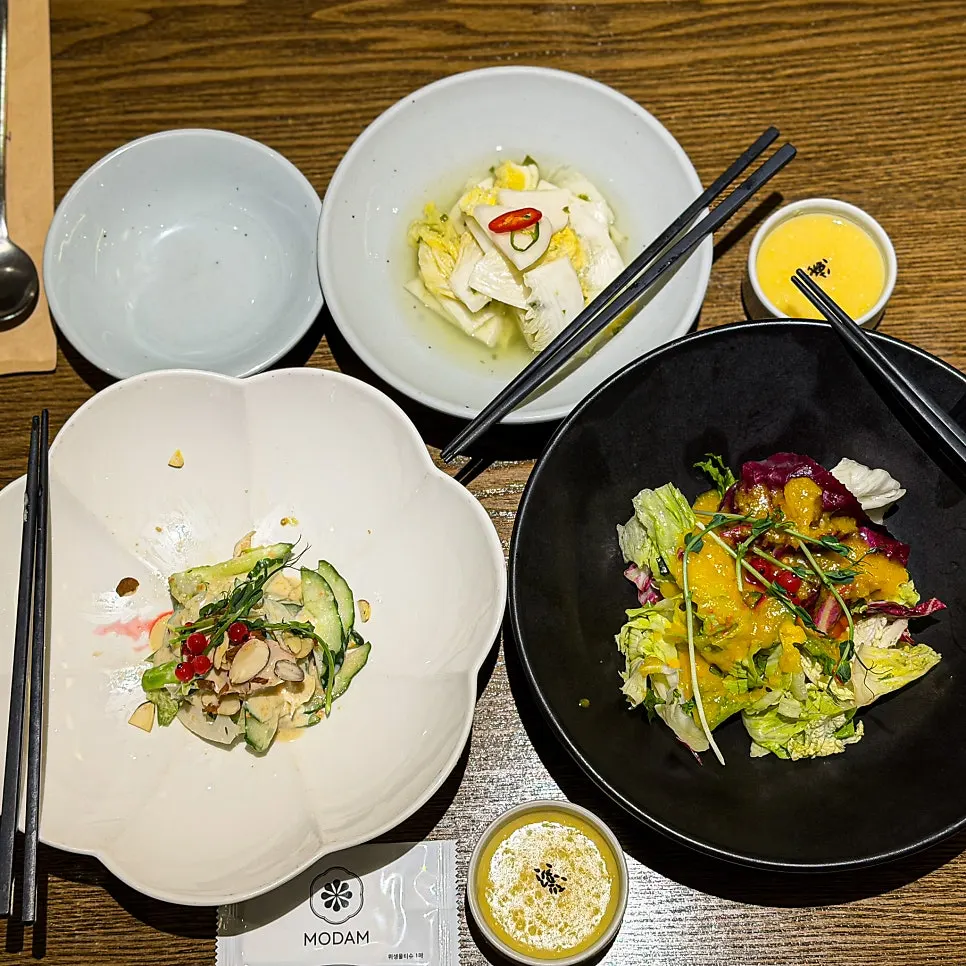 First course of seasonal porridge, salad, and baek-kimchi