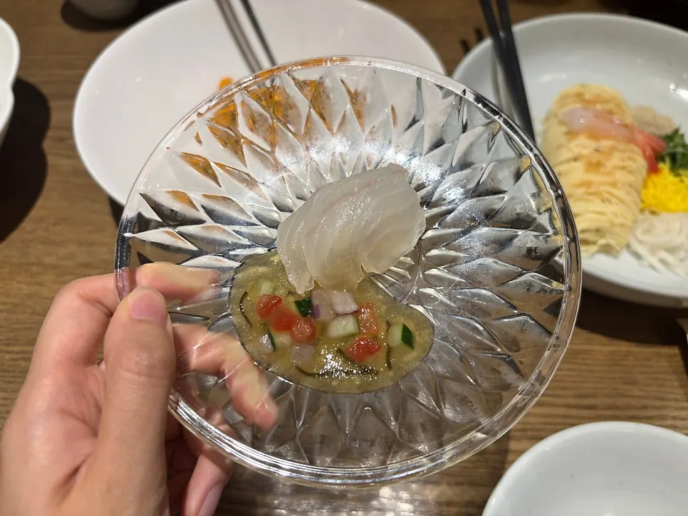 Halibut hoe served with white kimchi and citron sauce