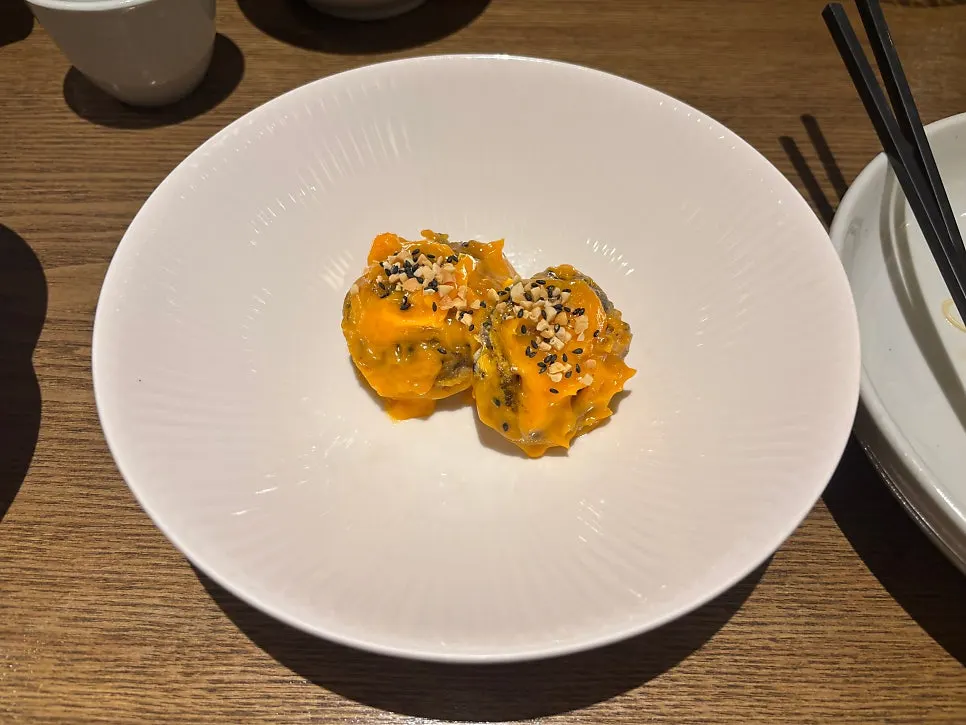 Fried shiitake mushroom topped with cheese sauce