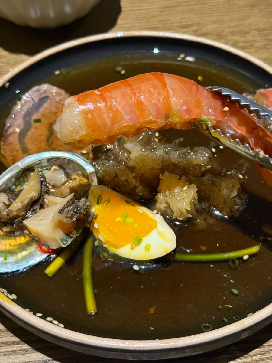 Plate of red shrimp, octopus and abalone in jang sauce