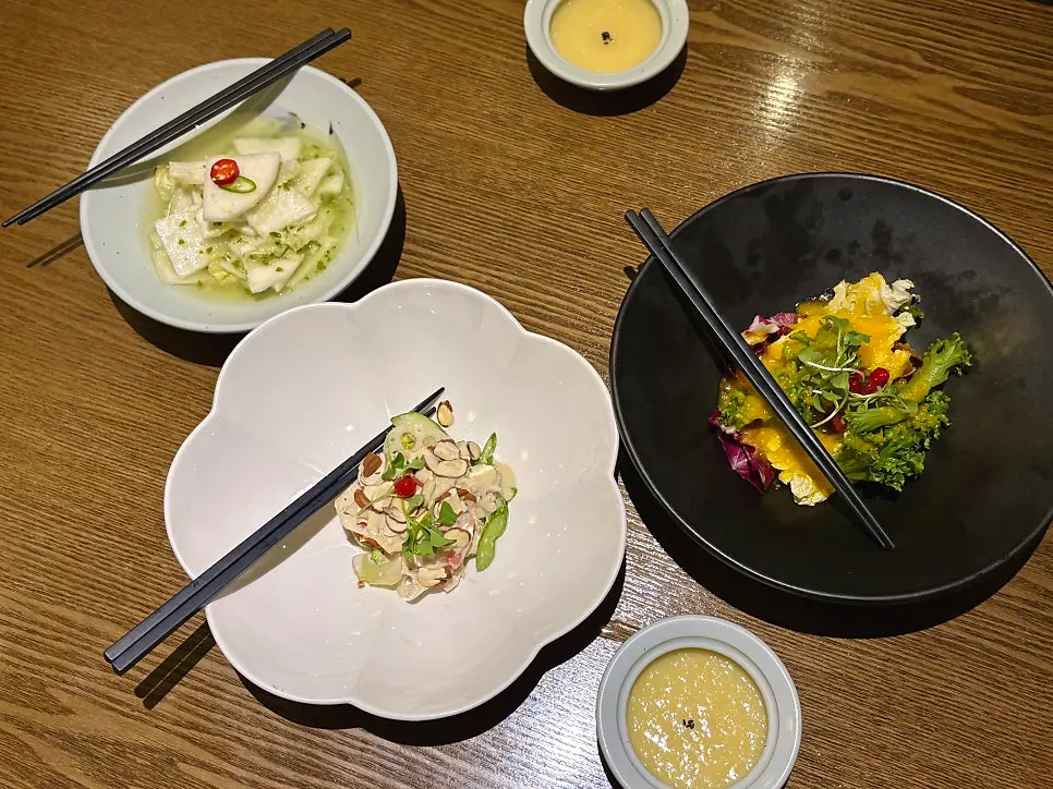 Separate serving chopsticks set out for each dish