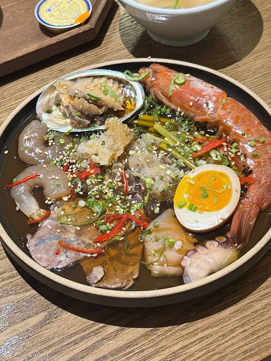 A plate of side dishes from the Modam Dining set meal