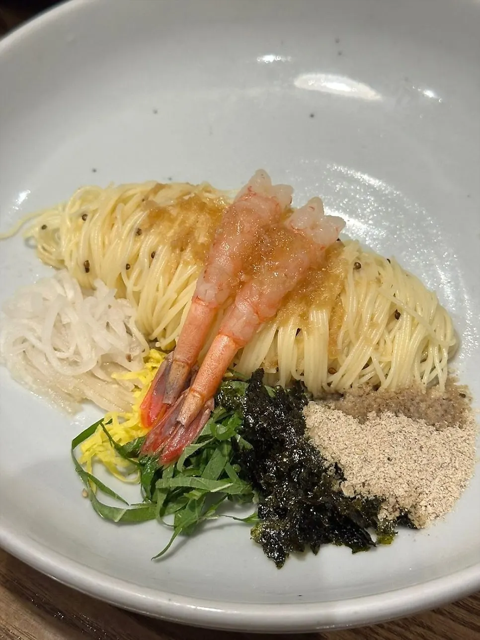 Neatly presented salmon sashimi starter