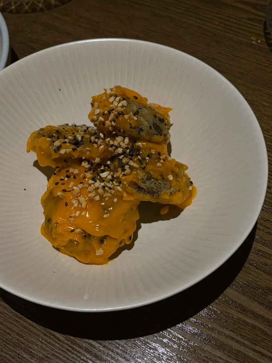 Mustard vegetables and salad served onto individual plates