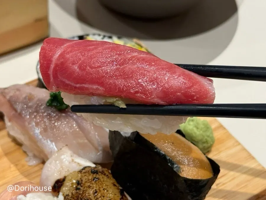 Torched swordfish belly sushi with cheese garlic sauce