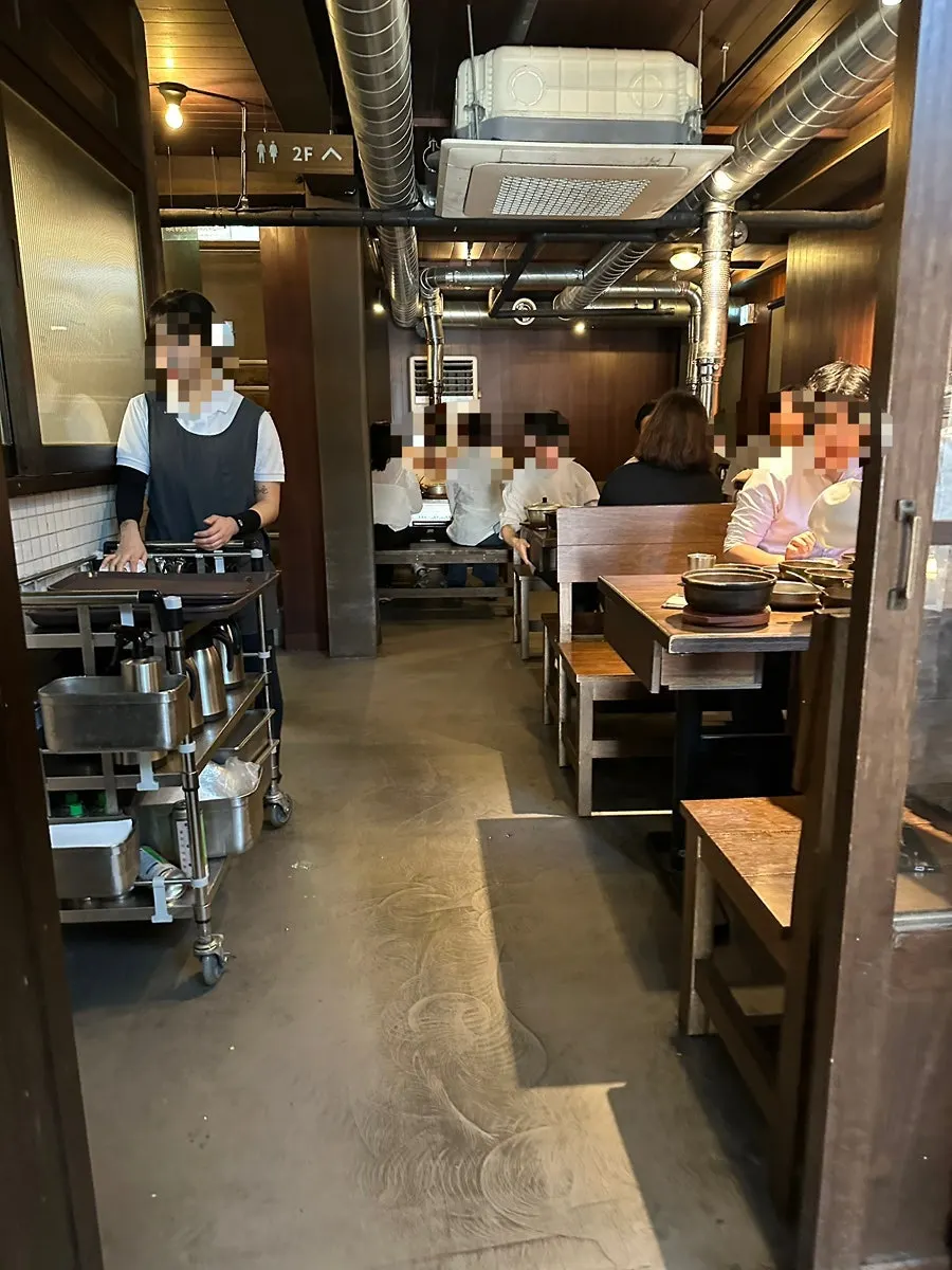 Interior view of the two-floor Eom Yongbaek Pork Grill Gwanghwamun Branch