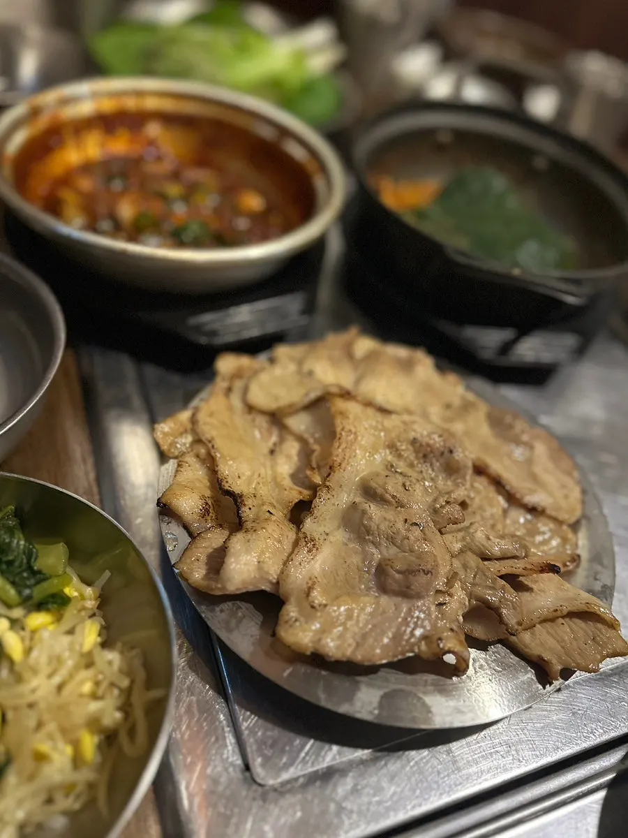 Plate of soy sauce bulgogi grilled over charcoal