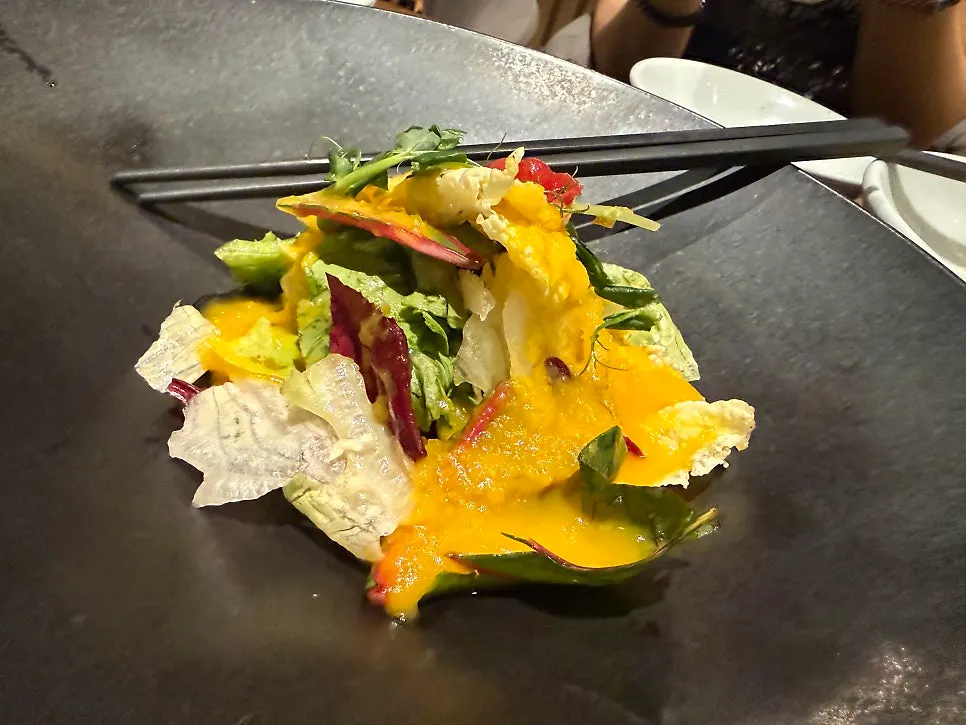 Starter salad with orange dressing