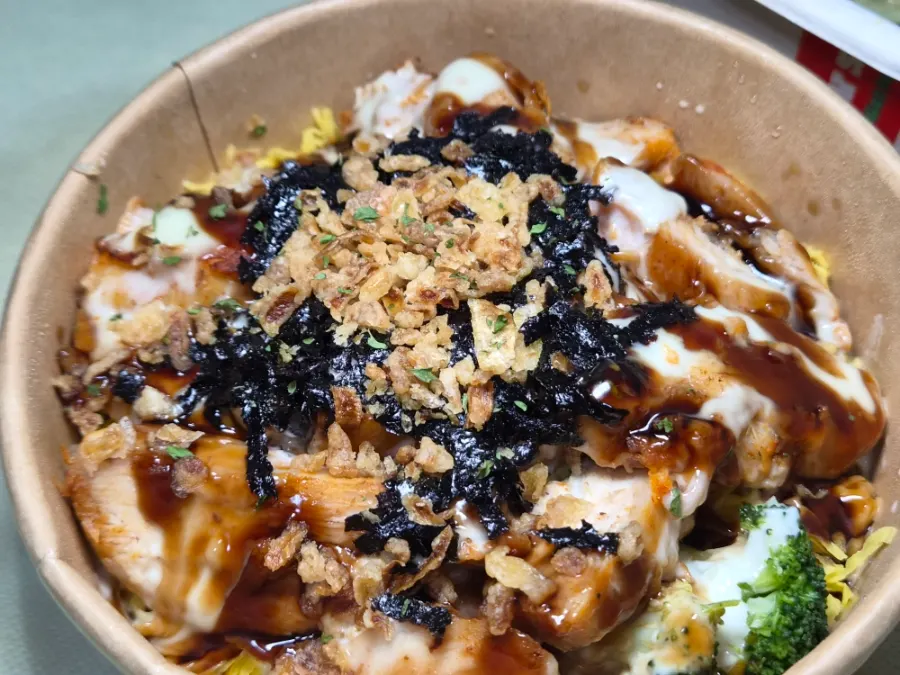 Chicken protein rice bowl topped with plenty of egg strips