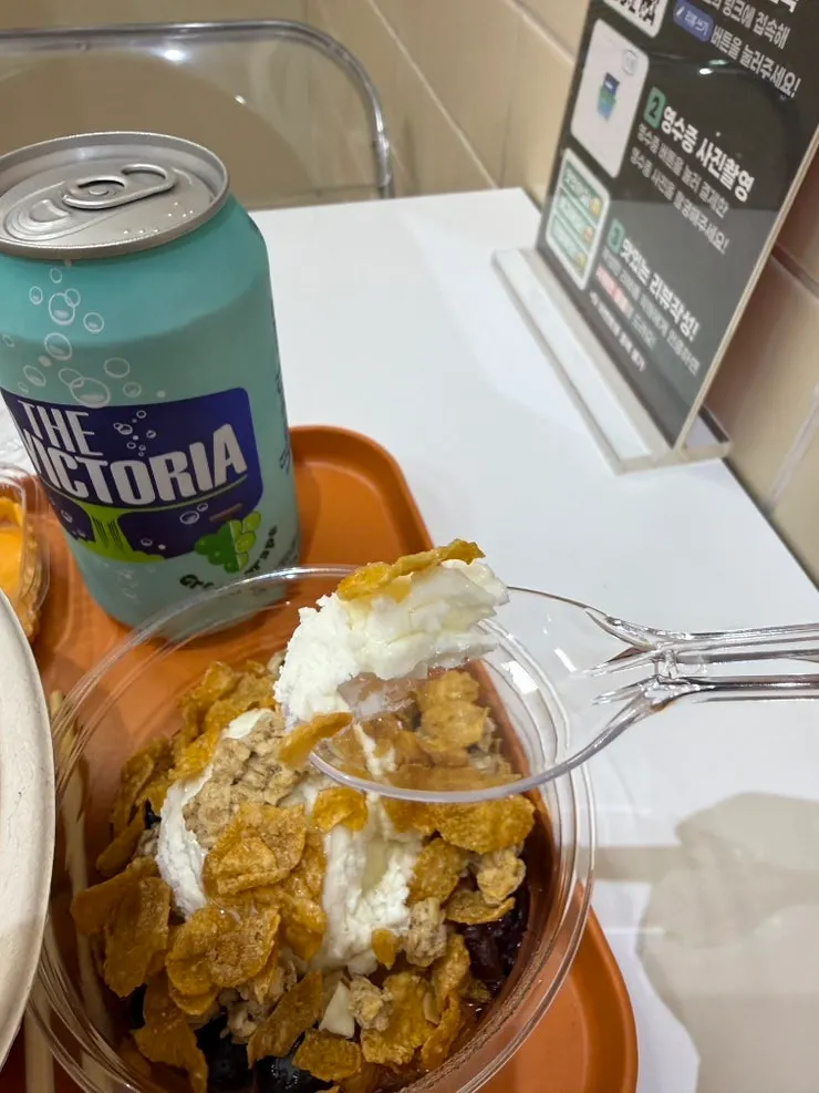 Greek yogurt topped with nuts and cereal
