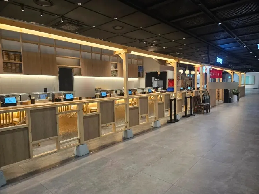Open-kitchen-style seating at Elephant Sushi