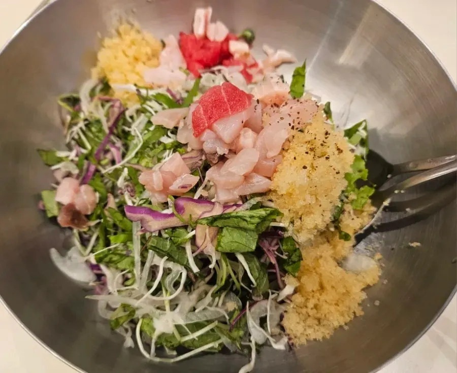 Hoe-deopbap topped with sashimi, flying-fish roe, and vegetables