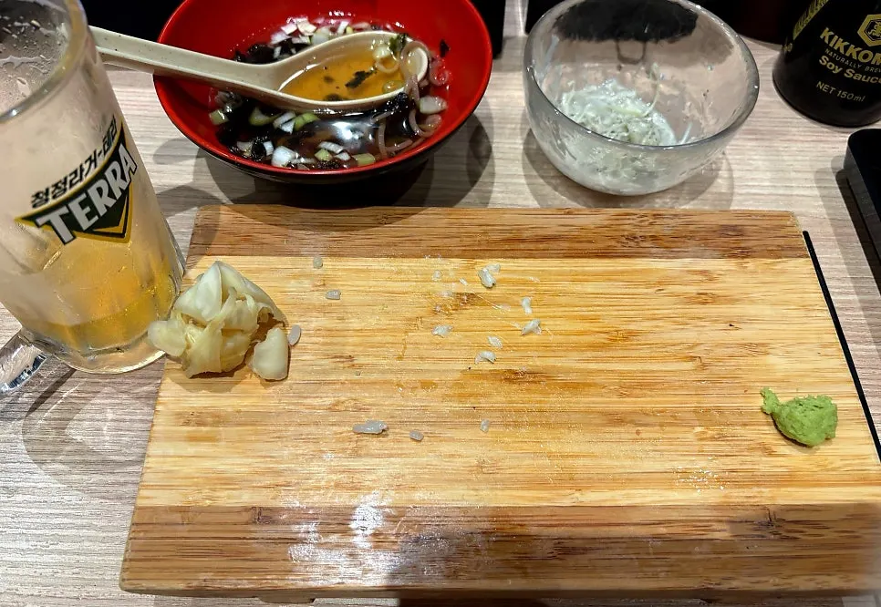 An empty, finished sushi plate