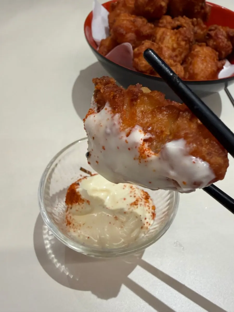 Karaage dipped in shichimi mayo sauce