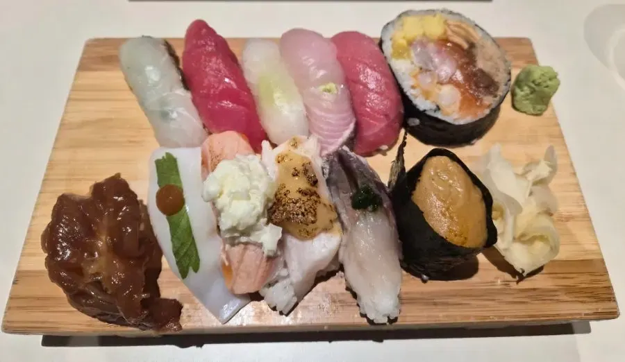 White fish, salmon, and soy-marinated shrimp sushi