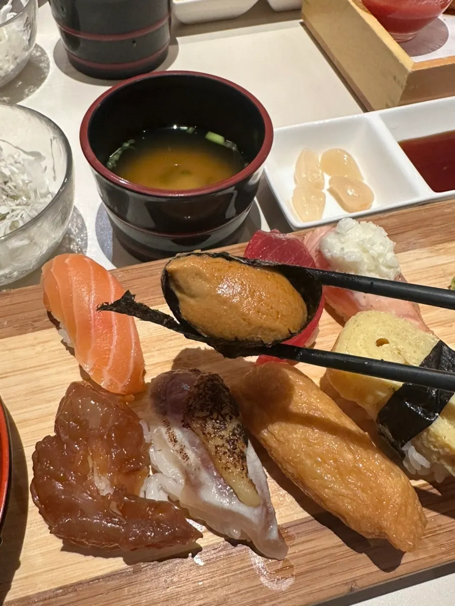 Salmon sushi and white fish sushi cut to just the right thickness
