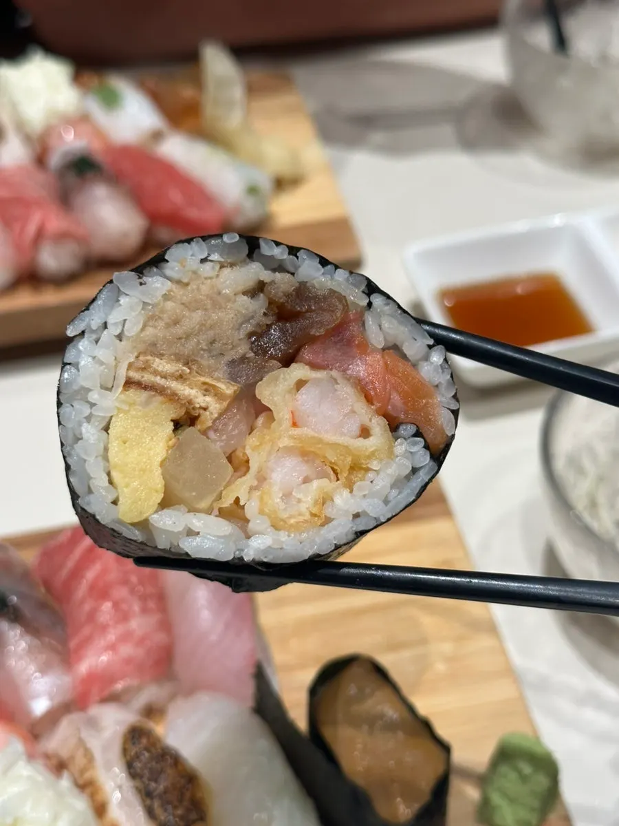 Futomaki roll with amberjack, toro, and horse mackerel sushi
