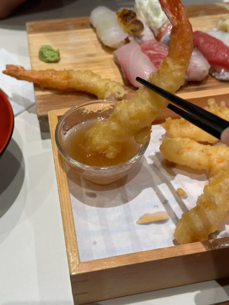 Cross-section of crisp-outside, juicy-inside shrimp tempura