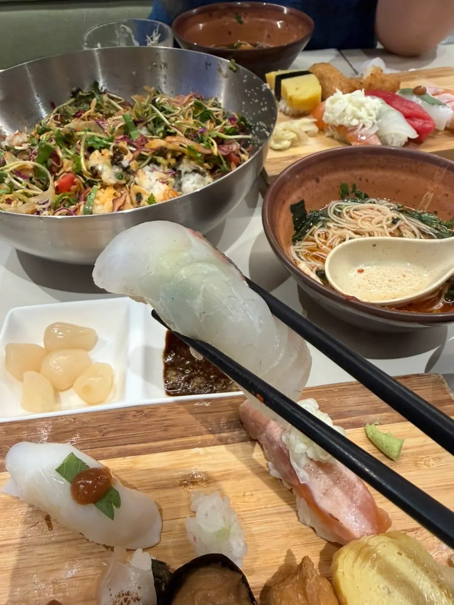 A spoonful of the sashimi rice bowl