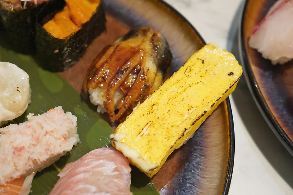 Close-up of special sushi showing rice and fish combination