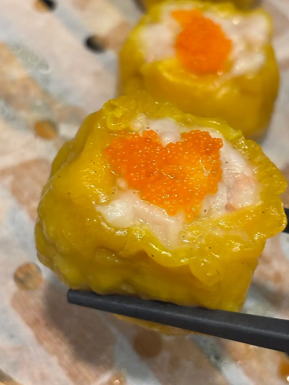 Shumai picked up with chopsticks