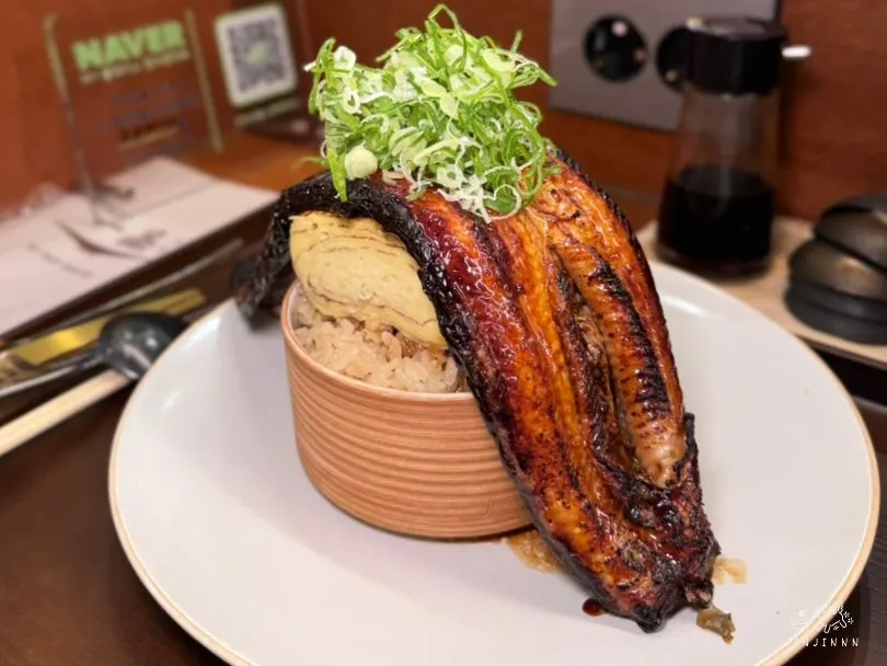 Unagi don topped with a whole eel