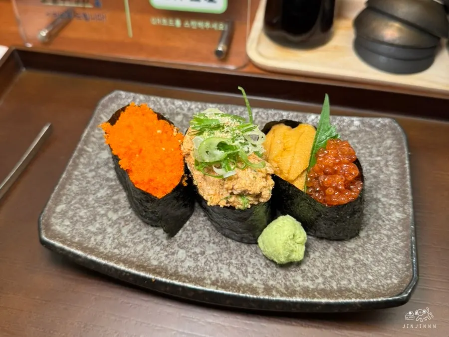 Three-piece uni and ankimo gunkan sushi