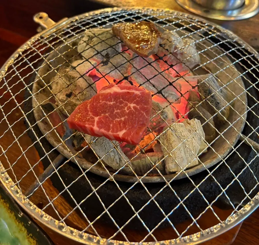 Chicken neck meat grilled over charcoal