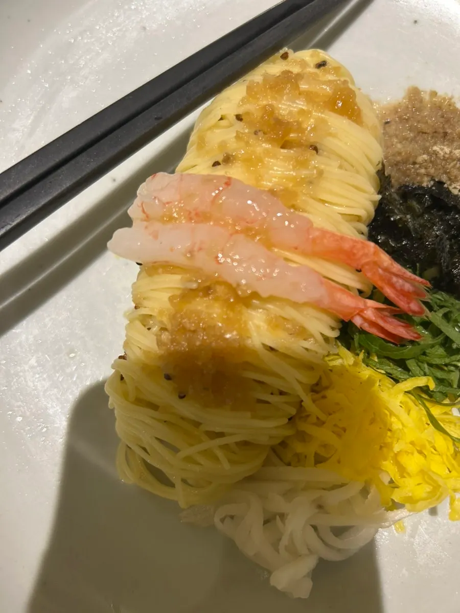 Capellini topped with sweet shrimp