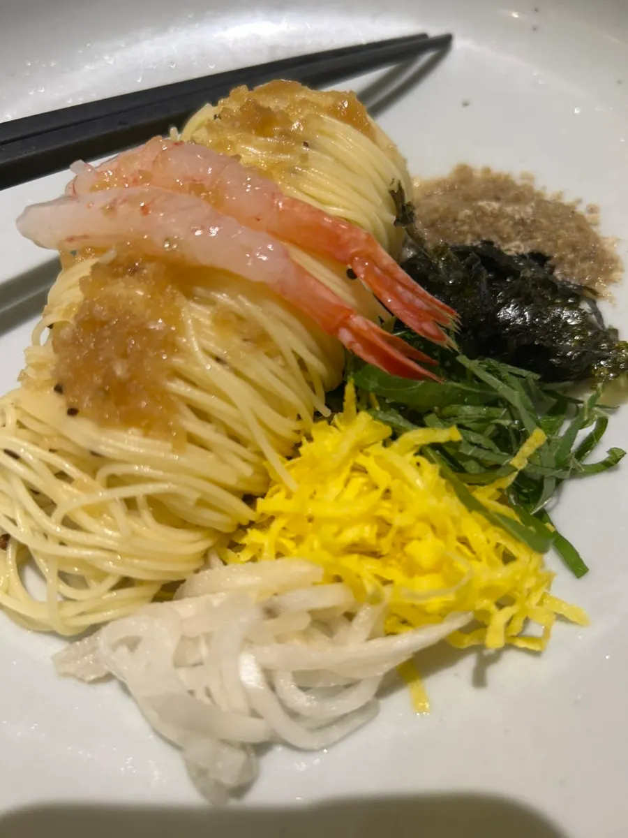 A plate of thin-noodle sweet shrimp capellini