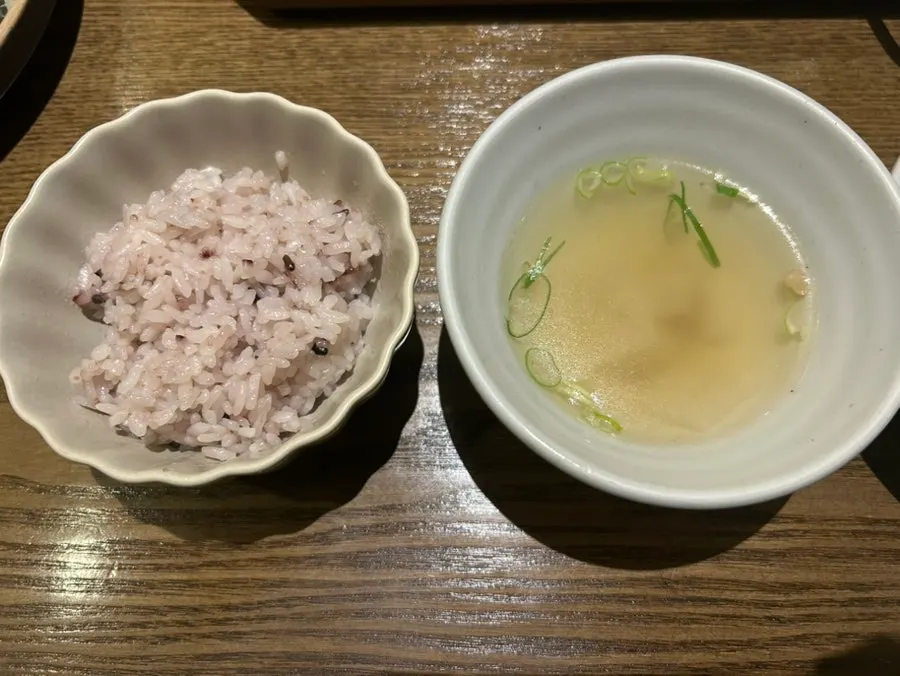 Rice, soup, and four side dishes on the table