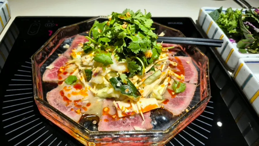First course, a plate of beef mustard salad