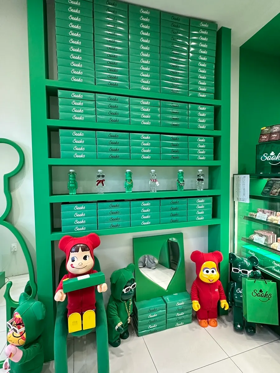 Green-themed store interior