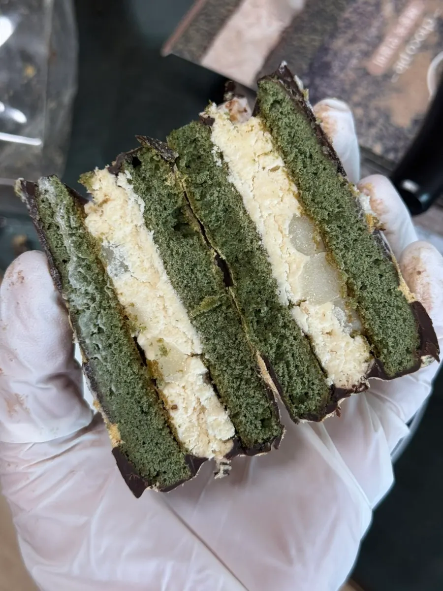 Cross-section of the choco pie cut in half showing the fresh cream