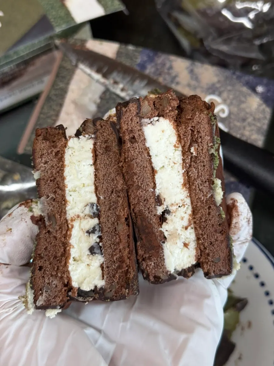 Handmade choco pies cut in half by flavor for tasting