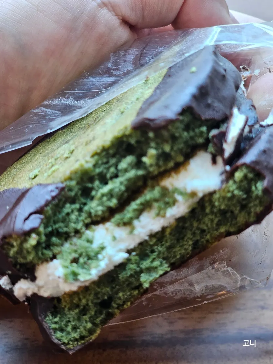 A bitten mugwort choco pie showing the inside