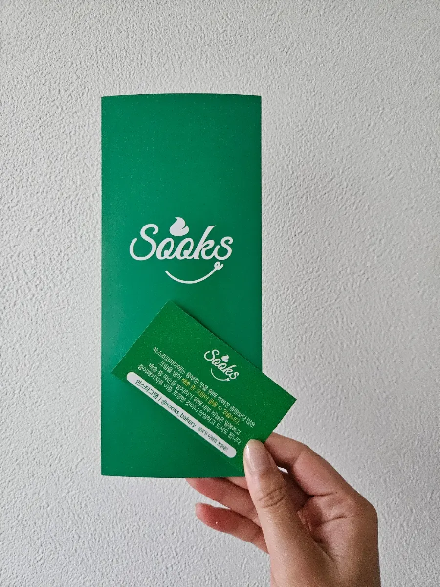Pamphlet and business card included with the set