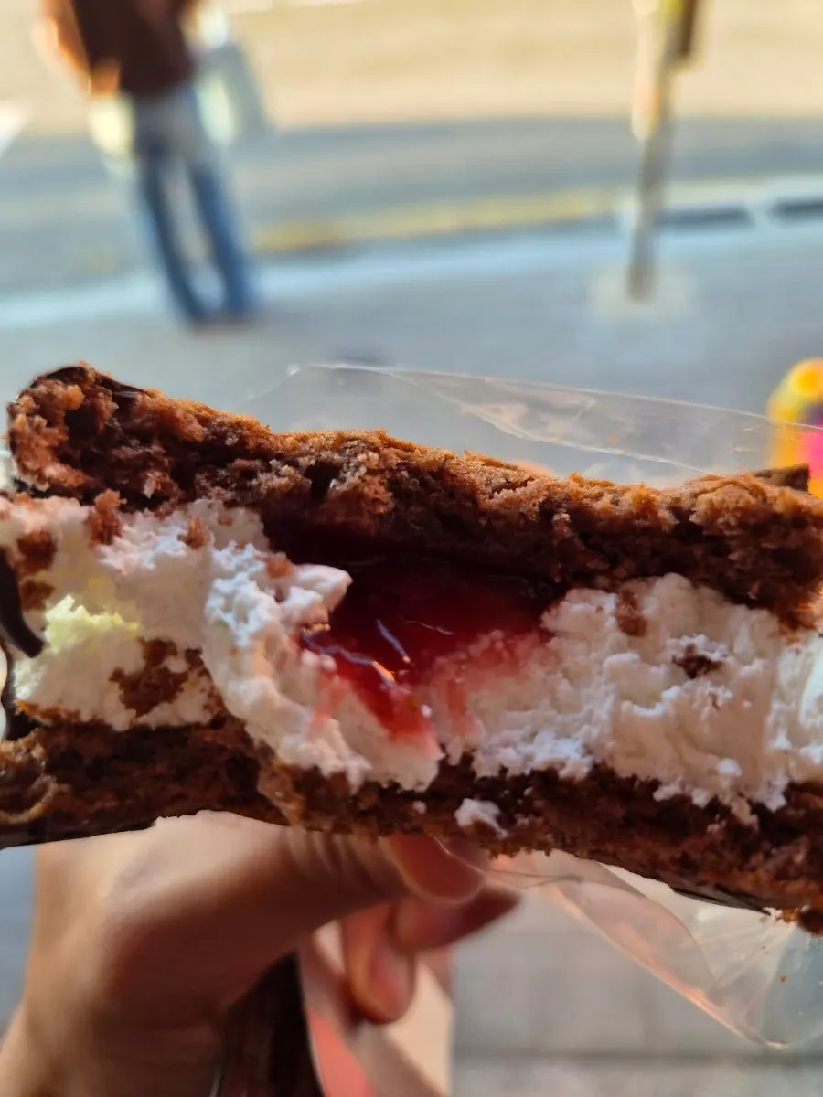 A bite taken out of the strawberry choco pie