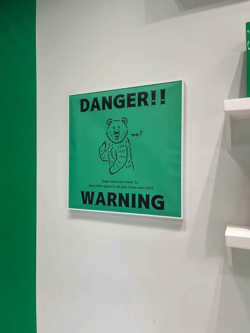 Bear warning poster displayed inside the store