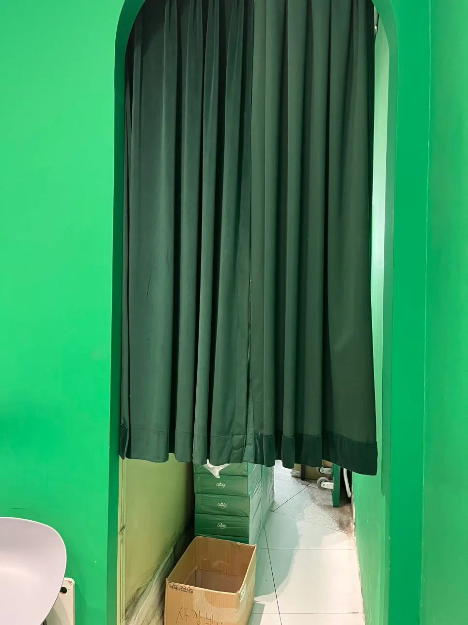 Curtained-off work area inside the store