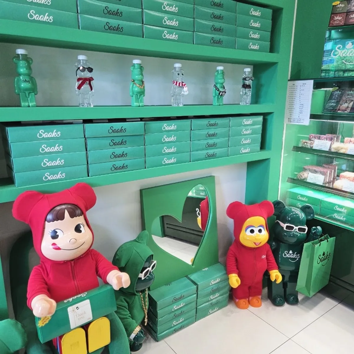 Cute props and green packaging placed around the store