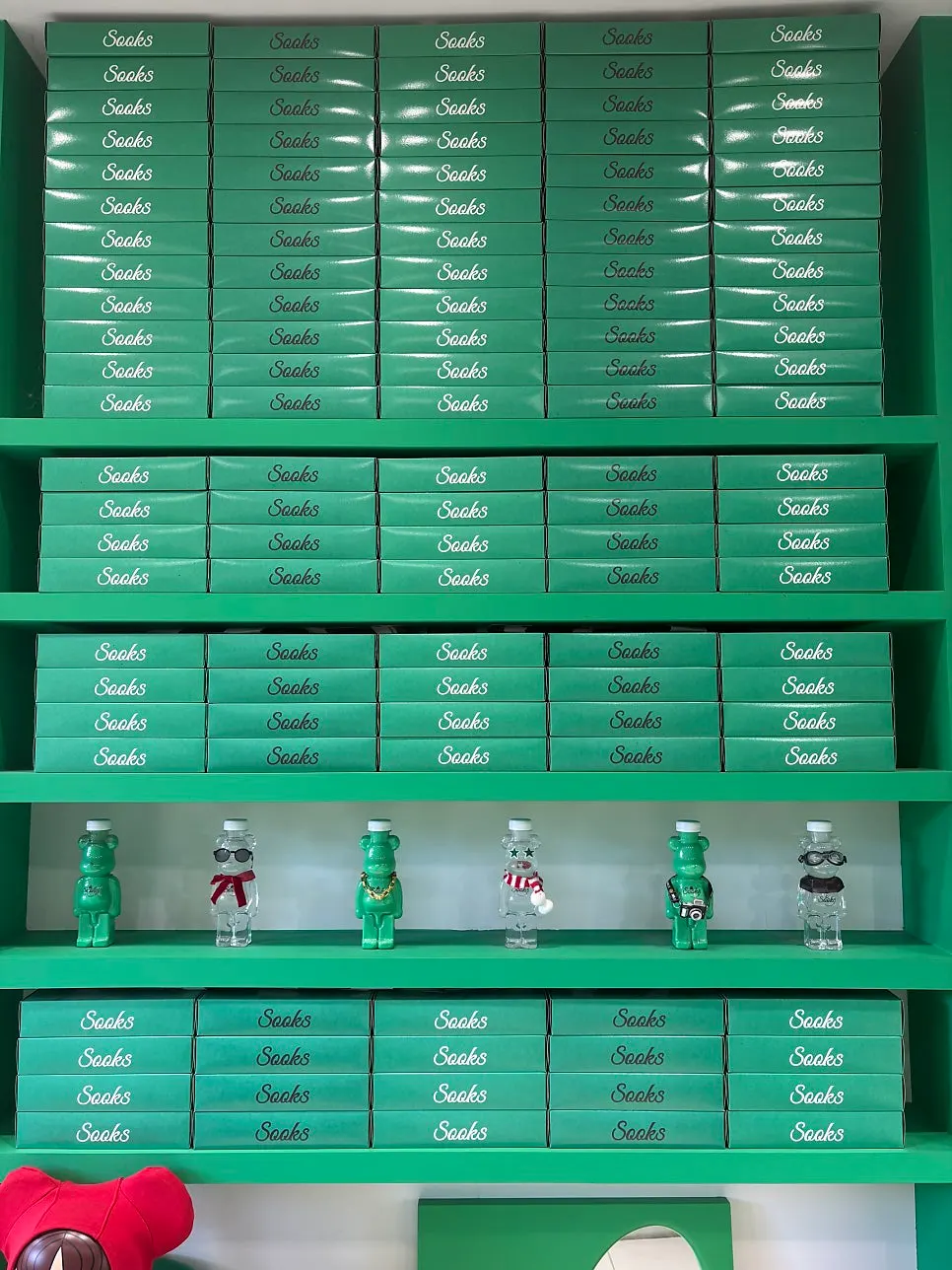 View of the green Ssuk's Choco Pie storefront deep inside Gwangjang Market