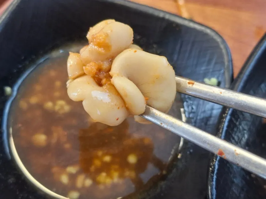 Monkfish meat dipped in wasabi sauce