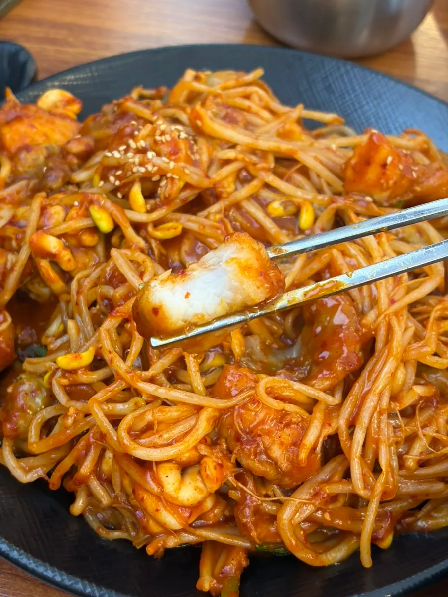Monkfish stew piled high with bean sprouts