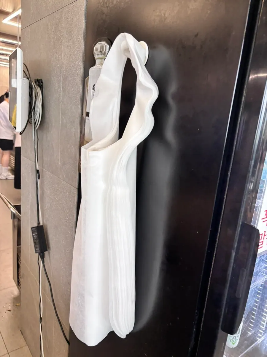 Disposable aprons at the self-serve bar