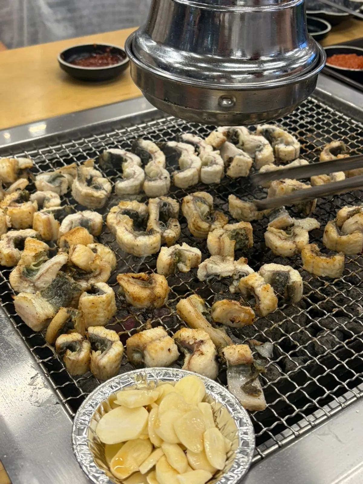 Grilling and eating eel